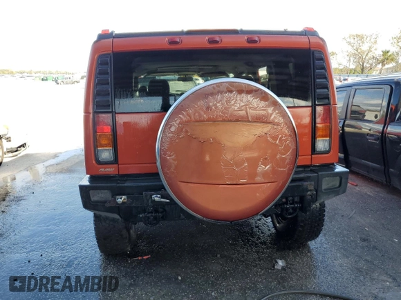 2003 Hummer H2 with VIN 5GRGN23U73H141713, listed as a Copart auction lot 84285624 with 152,719 mi miles and Non Repairable. Bid and sale history available at carsss.com. Image 6.