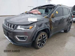2018 Jeep Compass Limited with VIN 3C4NJDCB4JT115647, listed as a IAAI auction lot 41728750 with 127,290 mi miles and . Bid and sale history available at carsss.com. Image 2.