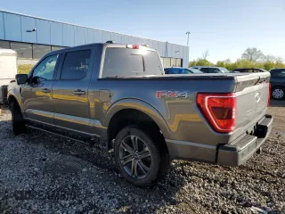 2021 Ford F-150 XL with VIN 1FTFW1E55MFA77310, listed as a Copart auction lot 56179055 with 48,990 mi miles and Salvage title. Bid and sale history available at DreamBid. Image 2.