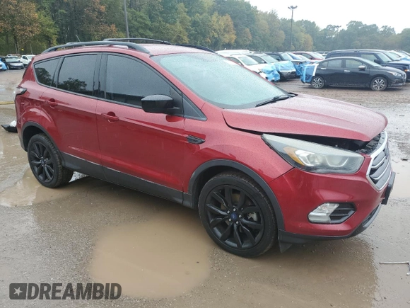 2018 Ford Escape SE z VIN 1FMCU9GD4JUA49819, wystawiony jako Copart lot #73023734 z przebiegiem 96 228 mil mil oraz Szkody całkowita. Historia ofert i sprzedaży dostępna na DreamBid. Obrazek 4.