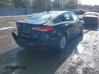 2020 Ford Fusion SE z VIN 3FA6P0LU4LR158954, wystawiony jako IAAI lot #41474425 z przebiegiem 76 966 mil mil oraz . Historia ofert i sprzedaży dostępna na DreamBid. Obrazek 4.