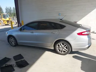 2015 Ford Fusion SE with VIN 3FA6P0H74FR138484, listed as a IAAI auction lot 42108827 with 134,622 mi miles and . Bid and sale history available at DreamBid. Image 14.