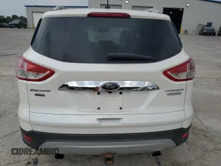 2014 Ford Escape Titanium с VIN 1FMCU0J97EUB15513, выставлен на аукционе Copart как лот 57391715 с пробегом 125 851 миль миль и Списание • Salvage title. История ставок и продаж доступна на DreamBid. Изображение 6.