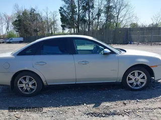 2008 Mercury Sable Premier z VIN 1MEHM42W28G613576, wystawiony jako IAAI lot #41900783 z przebiegiem 176 028 mil mil oraz . Historia ofert i sprzedaży dostępna na DreamBid. Obrazek 13.