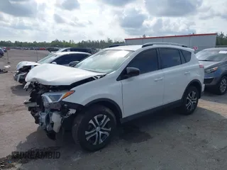 2017 Toyota RAV4 LE with VIN JTMZFREV3HJ143416, listed as a IAAI auction lot 41861981 with 115,241 mi miles and . Bid and sale history available at DreamBid. Image 17.