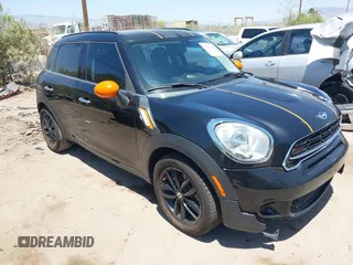2015 MINI Countryman S z VIN WMWZC3C5XFWT02566, wystawiony jako IAAI lot #42408045 z przebiegiem 114 822 mil mil oraz . Historia ofert i sprzedaży dostępna na DreamBid. Obrazek 1.