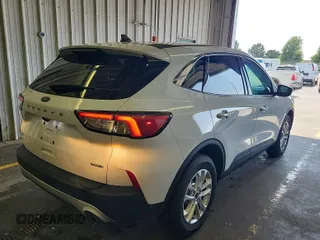 2020 Ford Escape SE with VIN 1FMCU9G60LUB25735, listed as a IAAI auction lot 42663606 with 91,591 mi miles and . Bid and sale history available at DreamBid. Image 43.