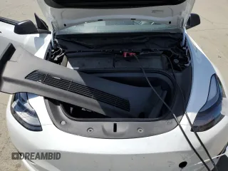 2022 Tesla Model Y Performance z VIN 7SAYGDEF6NF397082, wystawiony jako Copart lot #55823435 z przebiegiem Nie podano mil oraz Szkoda całkowita • Salvage title. Historia ofert i sprzedaży dostępna na DreamBid. Obrazek 12.