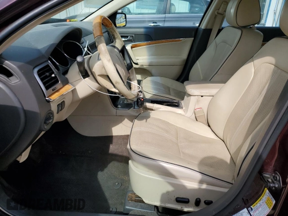 2011 Lincoln MKZ with VIN 3LNHL2JC0BR766629, listed as a Copart auction lot 56338015 with 118,728 mi miles and Salvage title. Bid and sale history available at DreamBid. Image 7.