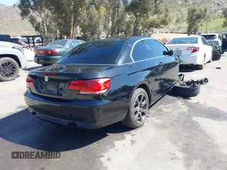 2007 BMW 3 Series 335i with VIN WBAWL73517PX49275, listed as a IAAI auction lot 41654471 with 203,928 mi miles. Bid and sale history available at carsss.com. Image 4.
