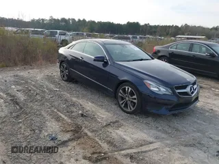 2015 Mercedes-Benz E-Class E 400 with VIN WDDKJ6FB4FF307393, listed as a IAAI auction lot 41775634 with 100,928 mi miles. Bid and sale history available at carsss.com. Image 1.