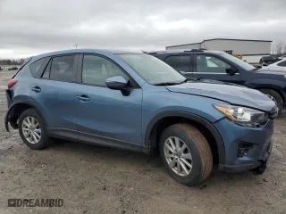 2016 Mazda CX-5 Touring with VIN JM3KE4CY4G0778032, listed as a Copart auction lot 52769065 with 81,443 mi miles and Salvage Title. Bid and sale history available at carsss.com. Image 4.