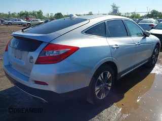 2013 Honda Crosstour EX-L z VIN 5J6TF2H56DL002499, wystawiony jako IAAI lot #42349382 z przebiegiem 174 542 mil mil oraz . Historia ofert i sprzedaży dostępna na DreamBid. Obrazek 4.
