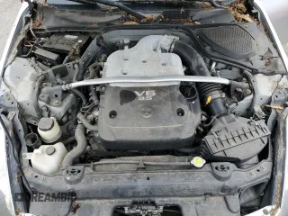 2004 Nissan 350Z Touring z VIN JN1AZ34E44T061263, wystawiony jako Copart lot #55530795 z przebiegiem 126 215 mil mil oraz Czysty tytuł • Clean title. Historia ofert i sprzedaży dostępna na DreamBid. Obrazek 11.