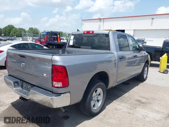 2023 Ram 1500 SLT z VIN 1C6RR7LG0PS517769, wystawiony jako IAAI lot #42451307 z przebiegiem 49 931 mil mil oraz . Historia ofert i sprzedaży dostępna na DreamBid. Obrazek 4.