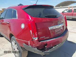 2015 Cadillac SRX Luxury Collection with VIN 3GYFNBE3XFS632316, listed as a IAAI auction lot 41798287 with 145,401 mi miles. Bid and sale history available at carsss.com. Image 6.