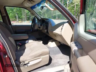 2005 Ford Explorer Sport Trac XLS z VIN 1FMZU77K95UB13467, wystawiony jako IAAI lot #42142049 z przebiegiem 164 156 mil mil oraz . Historia ofert i sprzedaży dostępna na DreamBid. Obrazek 5.