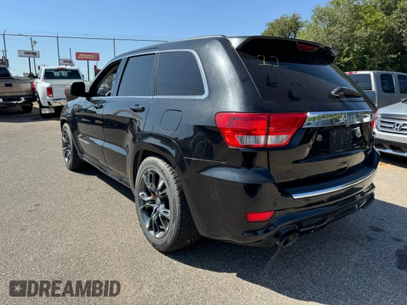 2012 Jeep Grand Cherokee SRT8 with VIN 1C4RJFDJ2CC111226, listed as a Copart auction lot 74449424 with 113,515 mi miles and Clean Title. Bid and sale history available at carsss.com. Image 3.