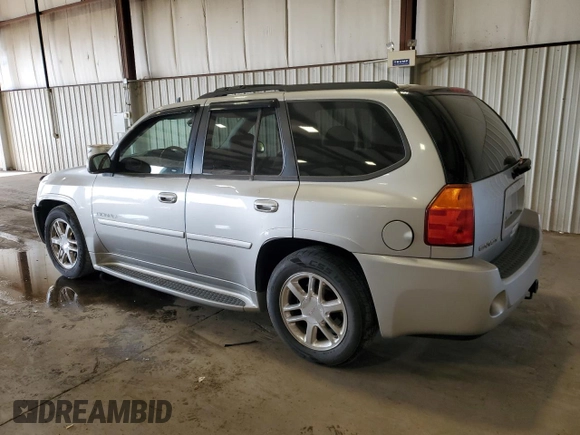 2008 GMC Envoy Denali with VIN 1GKET63M682243721, listed as a Copart auction lot 75963404 with 163,178 mi miles and Salvage Title. Bid and sale history available at DreamBid. Image 2.