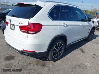 2017 BMW X5 sDrive35i with VIN 5UXKR2C53H0U19763, listed as a IAAI auction lot 41895725 with 101,361 mi miles. Bid and sale history available at carsss.com. Image 4.