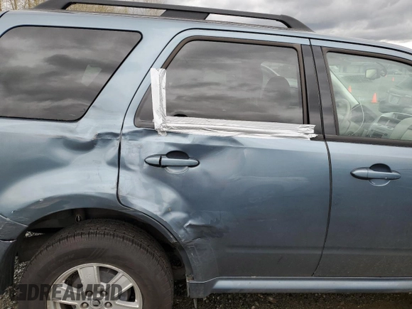 2011 Mercury Mariner with VIN 4M2CN8B76BKJ06364, listed as a Copart auction lot 50040745 with 153,675 mi miles and Salvage title. Bid and sale history available at DreamBid. Image 11.