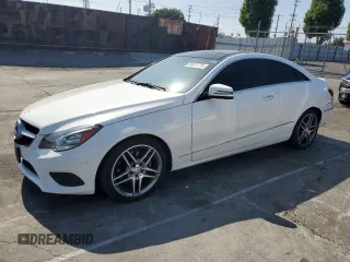 2015 Mercedes-Benz E 400 with VIN WDDKJ6FB1FF299883, listed as a Copart auction lot 59613735 with 104,107 mi miles and Salvage title. Bid and sale history available at DreamBid. Image 1.