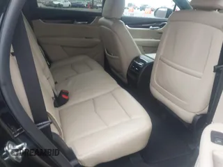 2019 Cadillac XT5 Premium Luxury FWD z VIN 1GYKNERS3KZ134635, wystawiony jako IAAI lot #41889843 z przebiegiem 56 044 mil mil oraz . Historia ofert i sprzedaży dostępna na DreamBid. Obrazek 8.