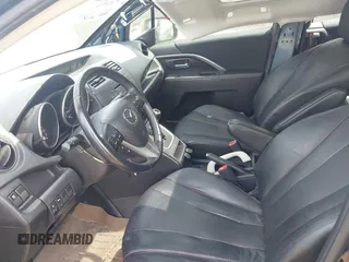 2014 Mazda 5 Grand Touring z VIN JM1CW2DL9E0171350, wystawiony jako IAAI lot #42113779 z przebiegiem 90 120 mil mil oraz . Historia ofert i sprzedaży dostępna na DreamBid. Obrazek 5.