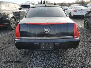 2006 Cadillac DTS 1SD z VIN 1G6KD57Y16U140102, wystawiony jako Copart lot #46145435 z przebiegiem 95 567 mil mil oraz Szkody całkowita. Historia ofert i sprzedaży dostępna na DreamBid. Obrazek 6.