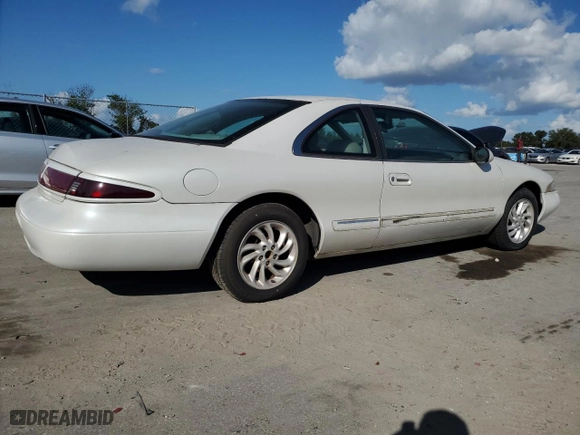 1997 Lincoln Mark VIII with VIN 1LNLM91V5VY659180, listed as a Copart auction lot 74809954 with NaN miles and Clean Title. Bid and sale history available at carsss.com. Image 3.
