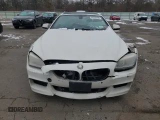 2015 BMW 6 Series 640i xDrive z VIN WBA6B8C55FD452972, wystawiony jako Copart lot #44559495 z przebiegiem 114 358 mil mil oraz Szkoda całkowita • Salvage title. Historia ofert i sprzedaży dostępna na DreamBid. Obrazek 5.