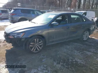 2019 Volkswagen Passat 2.0T Wolfsburg Edition with VIN 1VWLA7A37KC012589, listed as a IAAI auction lot 41394161 with 97,652 mi miles. Bid and sale history available at carsss.com. Image 17.