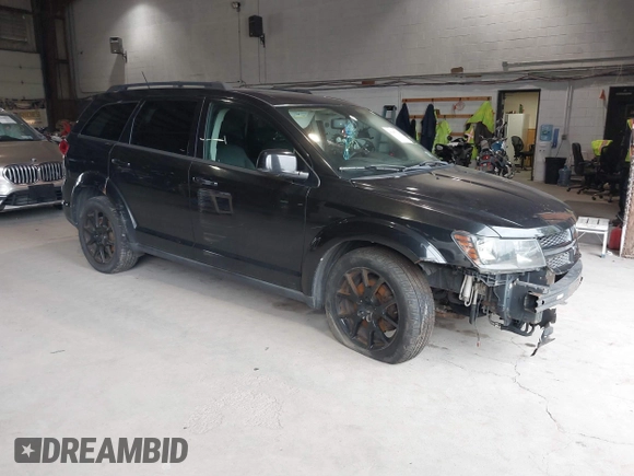 2013 Dodge Journey SXT with VIN 3C4PDDBG0DT660956, listed as a IAAI auction lot 41593385 with 196,021 mi miles and . Bid and sale history available at DreamBid. Image 1.