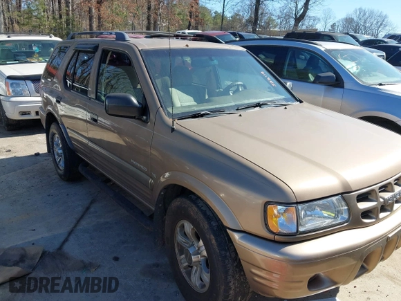 2001 Isuzu Rodeo S with VIN 4S2CK58W414322118, listed as a IAAI auction lot 41496624 with 244,189 mi miles and . Bid and sale history available at DreamBid. Image 1.