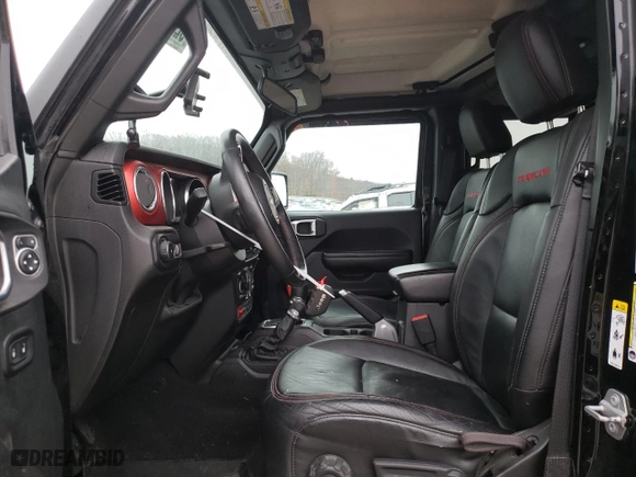 2018 Jeep Wrangler Unlimited Rubicon with VIN 1C4HJXFG1JW106940, listed as a Copart auction lot 82303054 with 83,492 mi miles and Salvage Title. Bid and sale history available at carsss.com. Image 7.