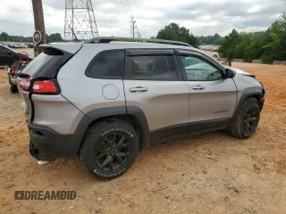 2016 Jeep Cherokee Trailhawk with VIN 1C4PJMBS4GW236966, listed as a Copart auction lot 63190565 with 101,017 mi miles and Salvage title. Bid and sale history available at DreamBid. Image 3.