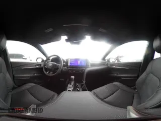 2025 Toyota Camry LE z VIN 4T1DAACK5SU554563, wystawiony jako IAAI lot #41788016 z przebiegiem 4 023 mil mil oraz . Historia ofert i sprzedaży dostępna na DreamBid. Obrazek 19.