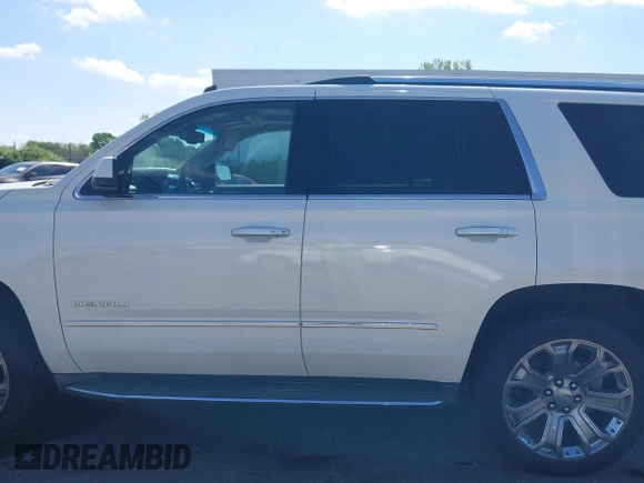 2015 GMC Yukon Denali with VIN 1GKS1CKJ3FR230797, listed as a IAAI auction lot 41977294 with 174,633 mi miles. Bid and sale history available at carsss.com. Image 14.
