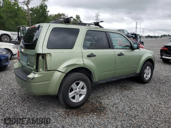 2009 Ford Escape Hybrid с VIN 1FMCU49339KC39089, выставлен на аукционе Copart как лот 56947025 с пробегом 145 098 миль миль и На запчасти • Non repairable. История ставок и продаж доступна на DreamBid. Изображение 3.