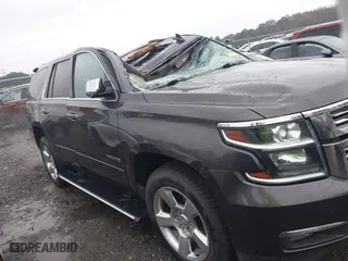 2015 Chevrolet Tahoe LTZ with VIN 1GNSCCKC7FR576236, listed as a IAAI auction lot 40794643 with 170,040 mi miles. Bid and sale history available at carsss.com. Image 13.