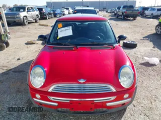 2003 MINI Hardtop with VIN WMWRC33413TC48601, listed as a IAAI auction lot 41418901 with 57,095 mi miles and . Bid and sale history available at DreamBid. Image 13.