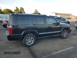 2008 Jeep Commander Limited with VIN 1J8HH58N98C236772, listed as a Copart auction lot 71042404 with 217,780 mi miles and Salvage Title. Bid and sale history available at carsss.com. Image 3.