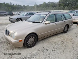 2001 Mercedes-Benz E-Class with VIN WDBJH65J41B312277, listed as a Copart auction lot 70261594 with 123,702 mi miles and Clean Title. Bid and sale history available at carsss.com. Image 1.