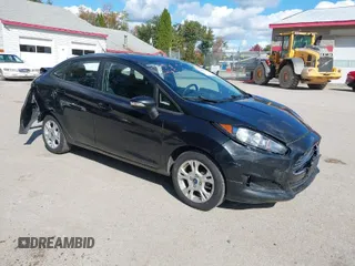 2015 Ford Fiesta SE with VIN 3FADP4BJXFM189438, listed as a IAAI auction lot 40535245 with 102,013 mi miles. Bid and sale history available at carsss.com. Image 1.