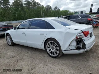 2014 Audi A8 L 3.0T with VIN WAURGAFD6EN004841, listed as a Copart auction lot 51474005 with 214,588 mi miles and Salvage Title. Bid and sale history available at carsss.com. Image 2.