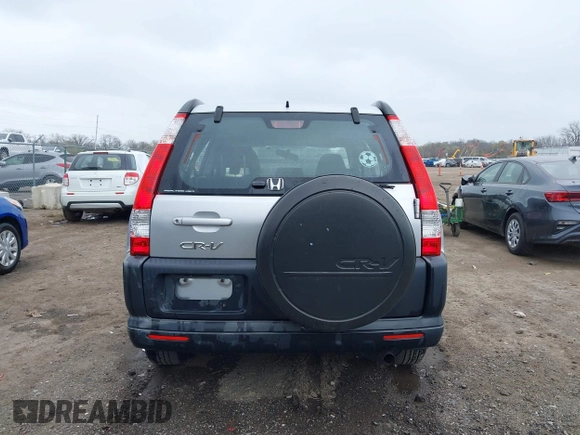 2006 Honda CR-V LX with VIN JHLRD78536C035954, listed as a IAAI auction lot 42043220 with 250,337 mi miles and . Bid and sale history available at carsss.com. Image 16.