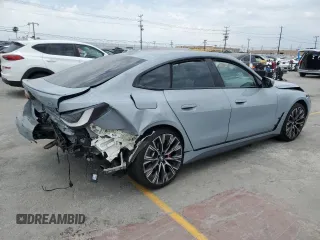 2022 BMW 4 Series 430i with VIN WBA63AV00NFM54895, listed as a Copart auction lot 59437215 with Not provided miles and Salvage title. Bid and sale history available at DreamBid. Image 3.