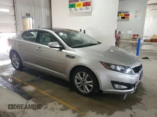 2011 Kia Optima EX z VIN KNAGN4A73B5168902, wystawiony jako Copart lot #59569365 z przebiegiem 160 297 mil mil oraz Szkoda całkowita • Salvage title. Historia ofert i sprzedaży dostępna na DreamBid. Obrazek 4.