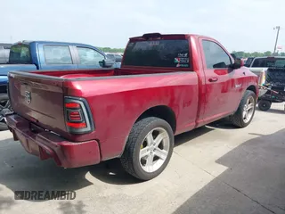 2014 Ram 1500 R/T with VIN 3C6JR6CT5EG153115, listed as a IAAI auction lot 41940587 with 142,323 mi miles. Bid and sale history available at carsss.com. Image 4.