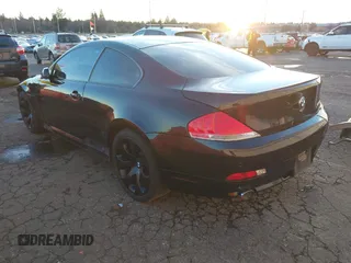 2007 BMW 6 Series 650i with VIN WBAEH13587CR51693, listed as a IAAI auction lot 41242717 with 219,742 mi miles. Bid and sale history available at carsss.com. Image 3.